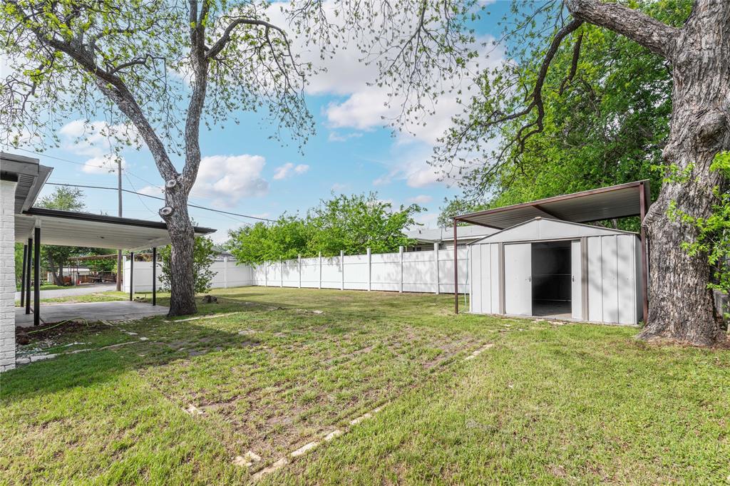 516 South Pecos Street Coleman, TX 76834 - Photo 29 of 32 a view of a house with a yard
