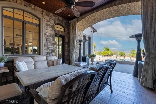 a kitchen with counter top space and windows