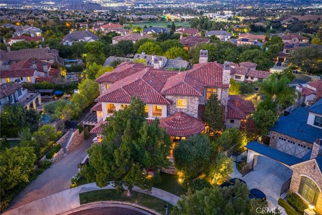 a lobby with furniture and a potted plant