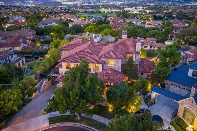 a lobby with furniture and a potted plant
