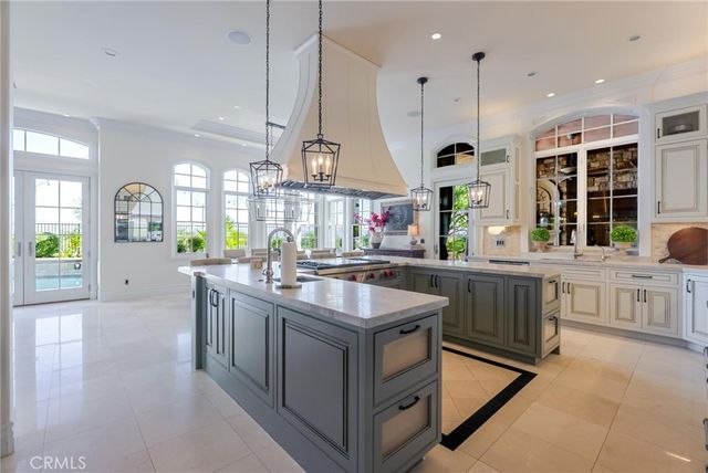 a bedroom with a large bed and a large window