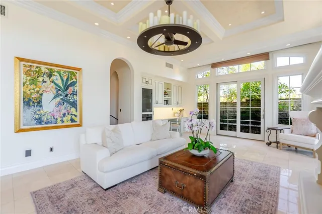 a bathroom with a granite countertop sink a toilet and a mirror