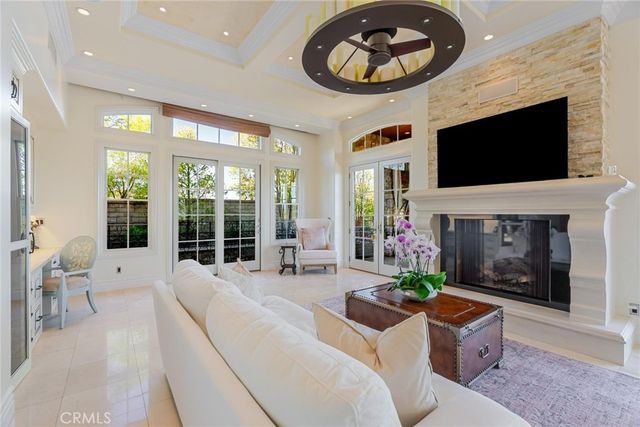 a bedroom with a bed and a potted plant
