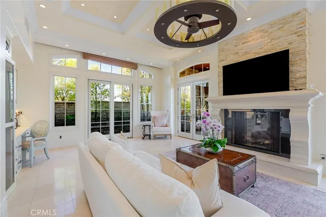 a bedroom with a bed and a potted plant