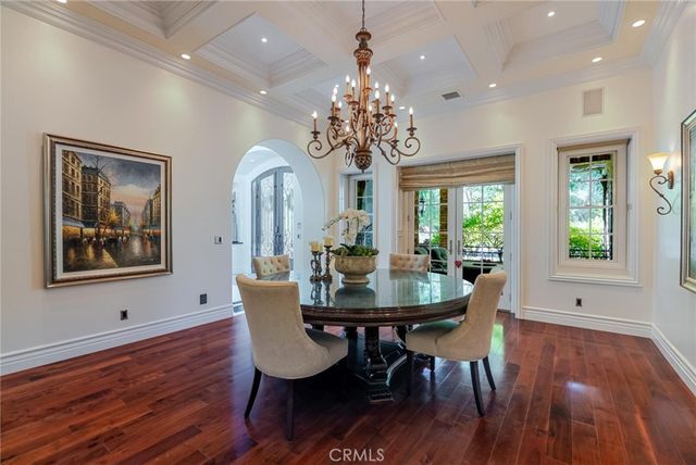 a living room with fireplace furniture and a flat screen tv
