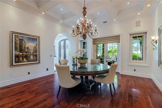 a living room with fireplace furniture and a flat screen tv