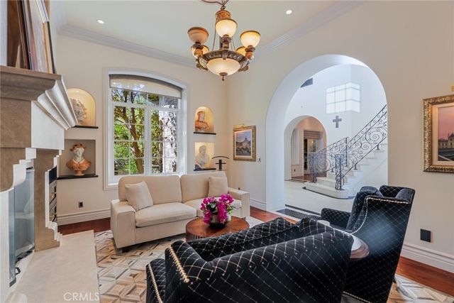 a bed room with a bed and a chair