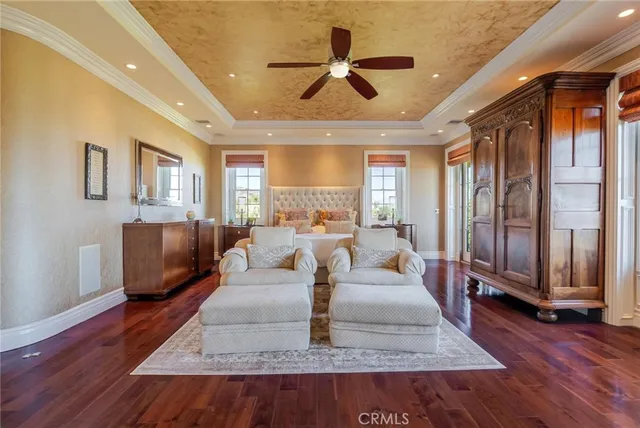 view of a bathroom with a granite countertop sink a toilet and shower