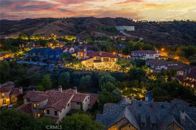 a stove top oven sitting inside of a kitchen