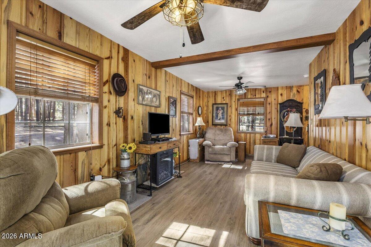 24 County Road 2065 Alpine, AZ 85920 - Photo 15 of 32 a living room with furniture and a flat screen tv