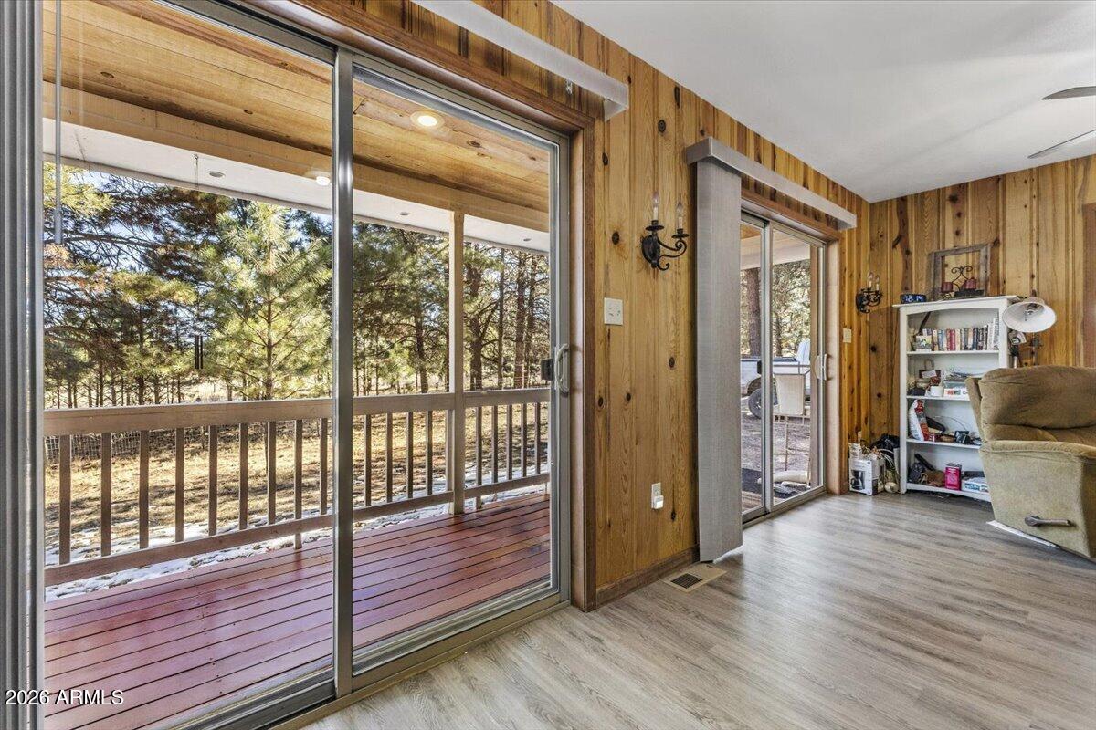 24 County Road 2065 Alpine, AZ 85920 - Photo 17 of 32 a view of a hallway with wooden floor and windows
