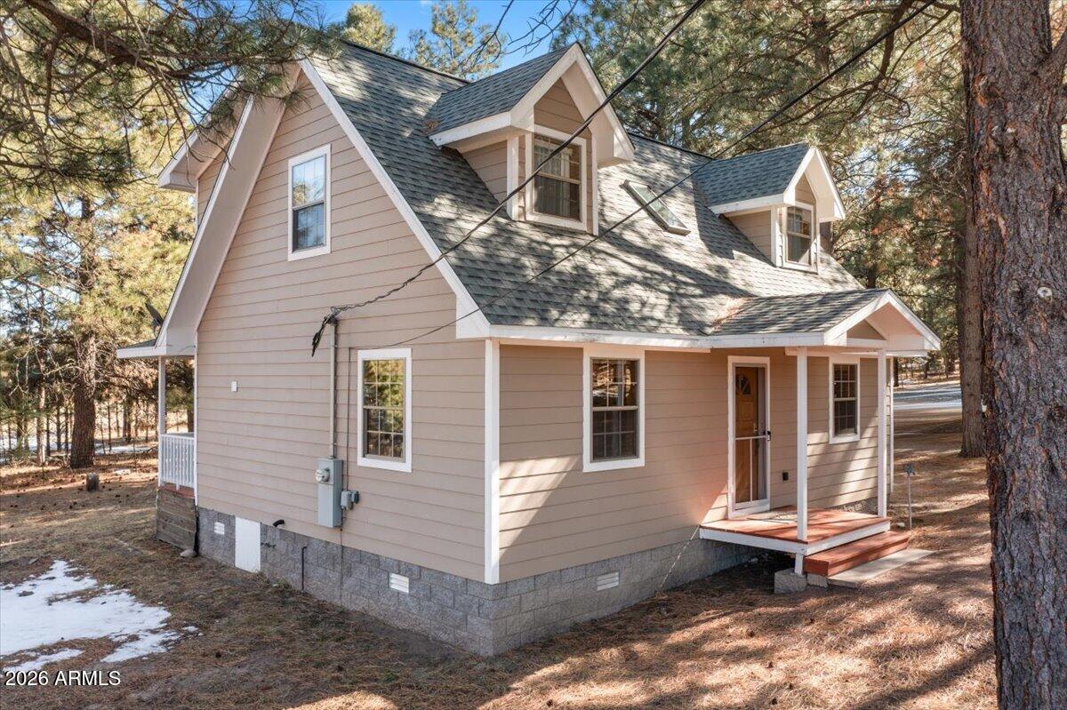24 County Road 2065 Alpine, AZ 85920 - Photo 27 of 32 a view of a house with a yard