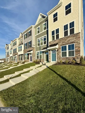 a front view of a building with garden