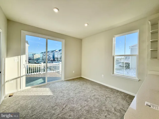 a view of a room with a large window