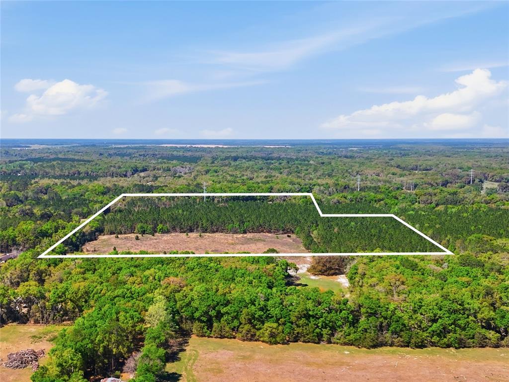 11791 Southwest 143rd Street Archer, FL 32618 - Photo 4 of 12 a view of a tennis court