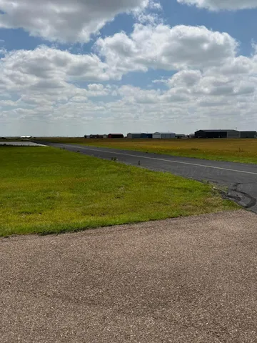 a view of a lake with a city