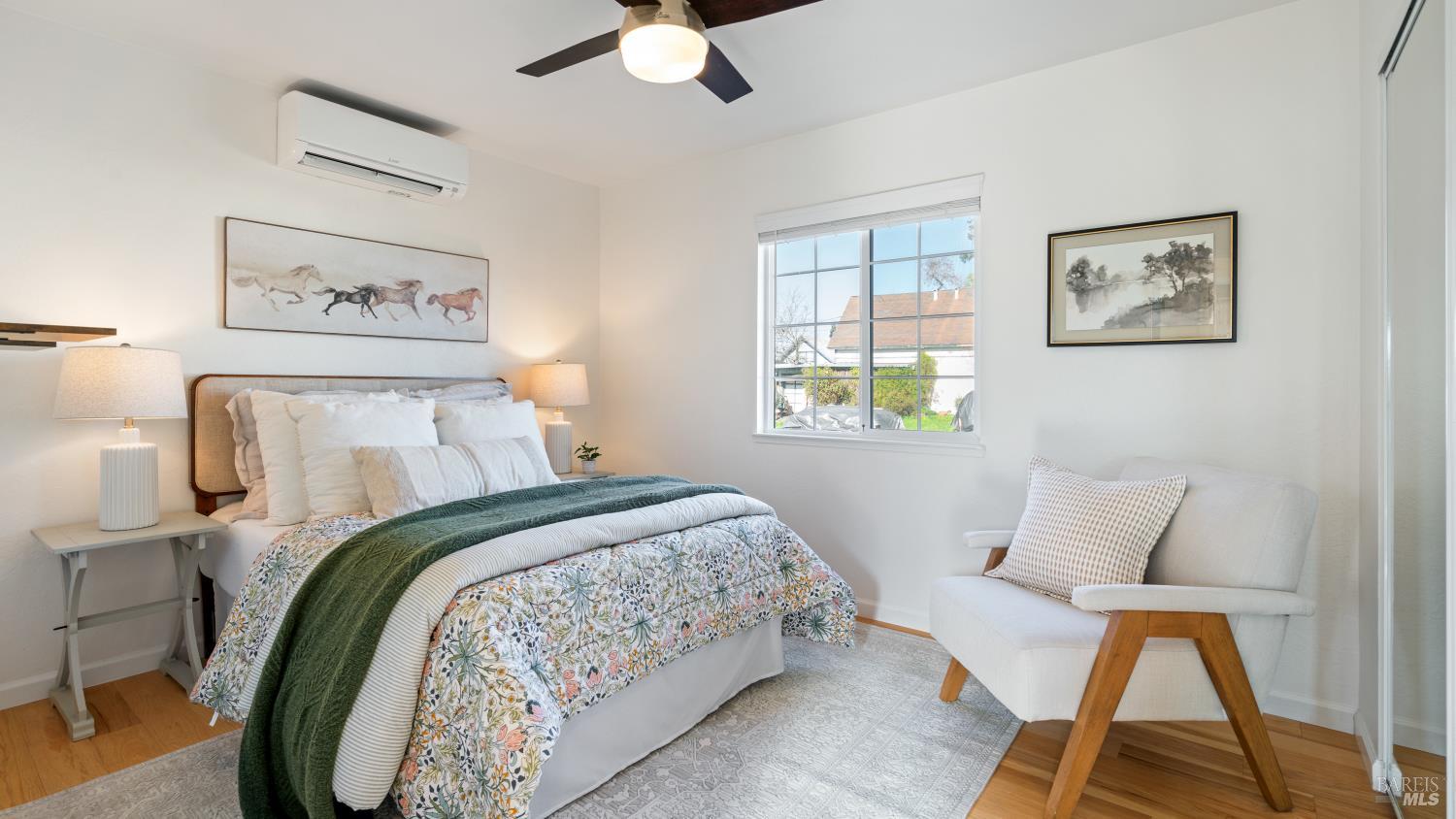 21 Alta Drive Petaluma, CA 94954 - Photo 12 of 22 a bedroom with a bed and a painting on the wall