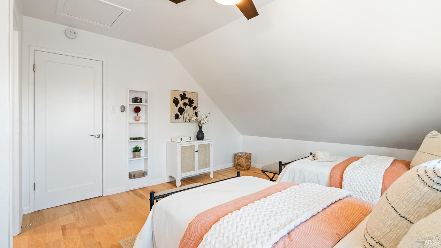 21 Alta Drive Petaluma, CA 94954 - Photo 15 of 22 a bedroom with a bed and cabinets