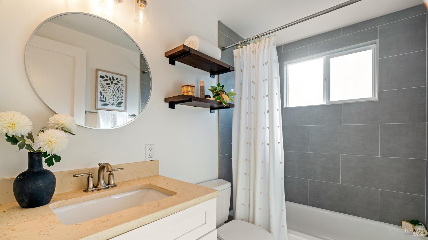 21 Alta Drive Petaluma, CA 94954 - Photo 10 of 22 a bathroom with a sink and a mirror