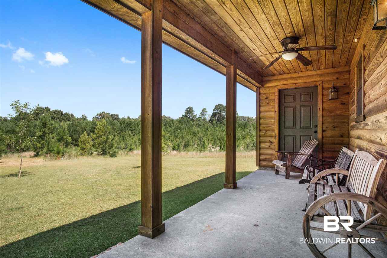 7785 Cuss Fork Road Wilmer, AL 36587 - Photo 30 of 38 Back porch 7 ft x 21 ft