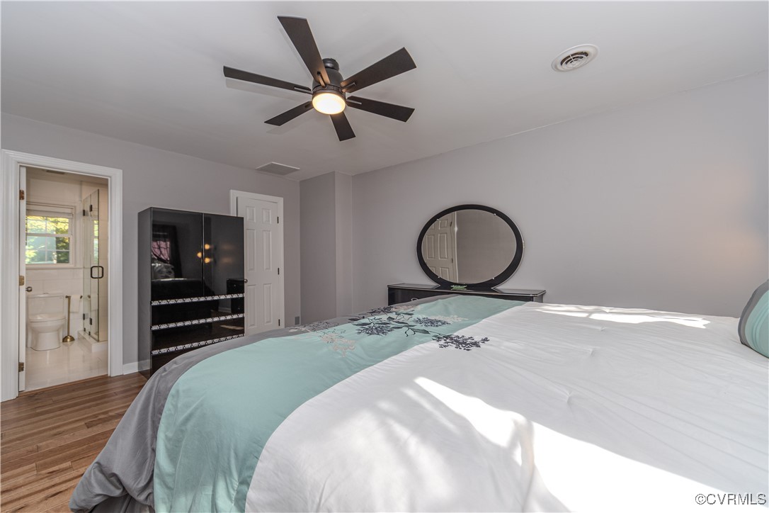 13318 Lady Ashley Road Midlothian, VA 23114 - Photo 22 of 37 Primary bedroom featuring ensuite bathroom, hardwo