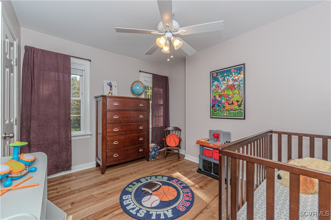 13318 Lady Ashley Road Midlothian, VA 23114 - Photo 28 of 37 Bedroom 5 with hardwood floor and a ceiling fan