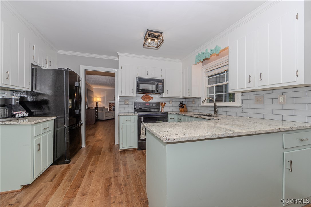 13318 Lady Ashley Road Midlothian, VA 23114 - Photo 8 of 37 Kitchen with tile backsplash adjoins the family ro