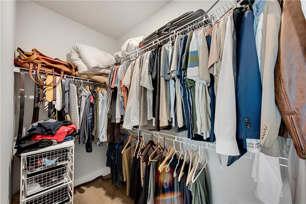 1 Ewing Way Dacula, GA 30019 - Photo 29 of 50 a view of walk in closet with clothes and shoes