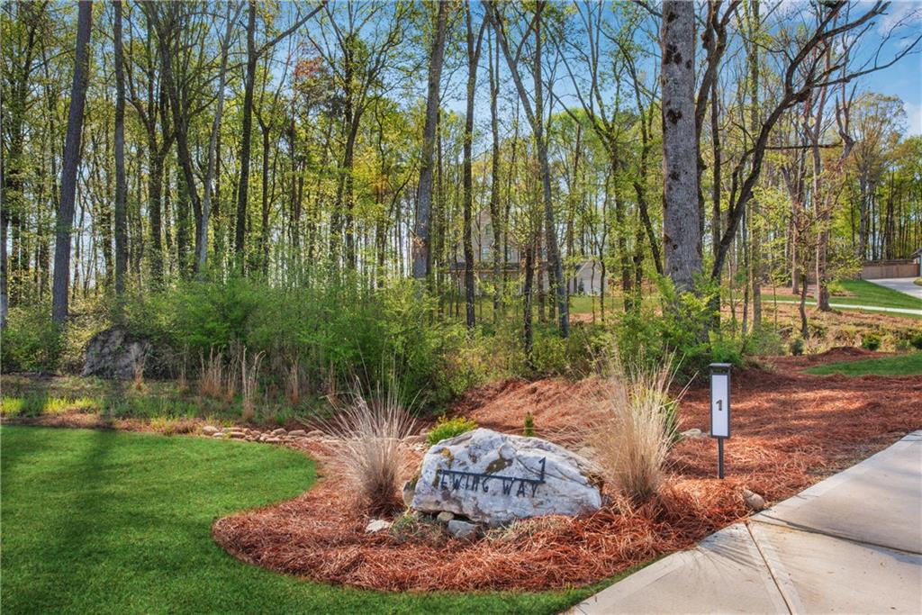 1 Ewing Way Dacula, GA 30019 - Photo 5 of 50 a garden view with a fountain