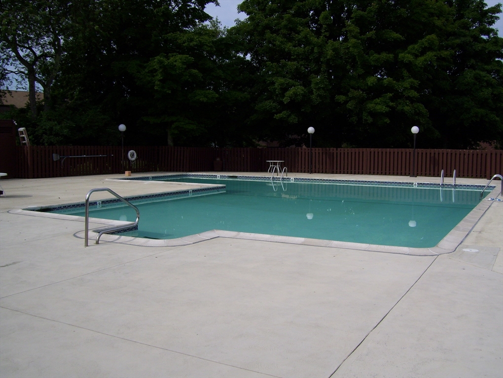 15 Davis Road, Unit B8 Acton, MA 01720 - Photo 4 of 4 a view of a swimming pool with a yard