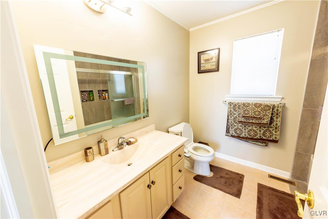 140 Fox Ridge Nazareth, PA 18064 - Photo 20 of 24 a bathroom with a sink vanity mirror and toilet