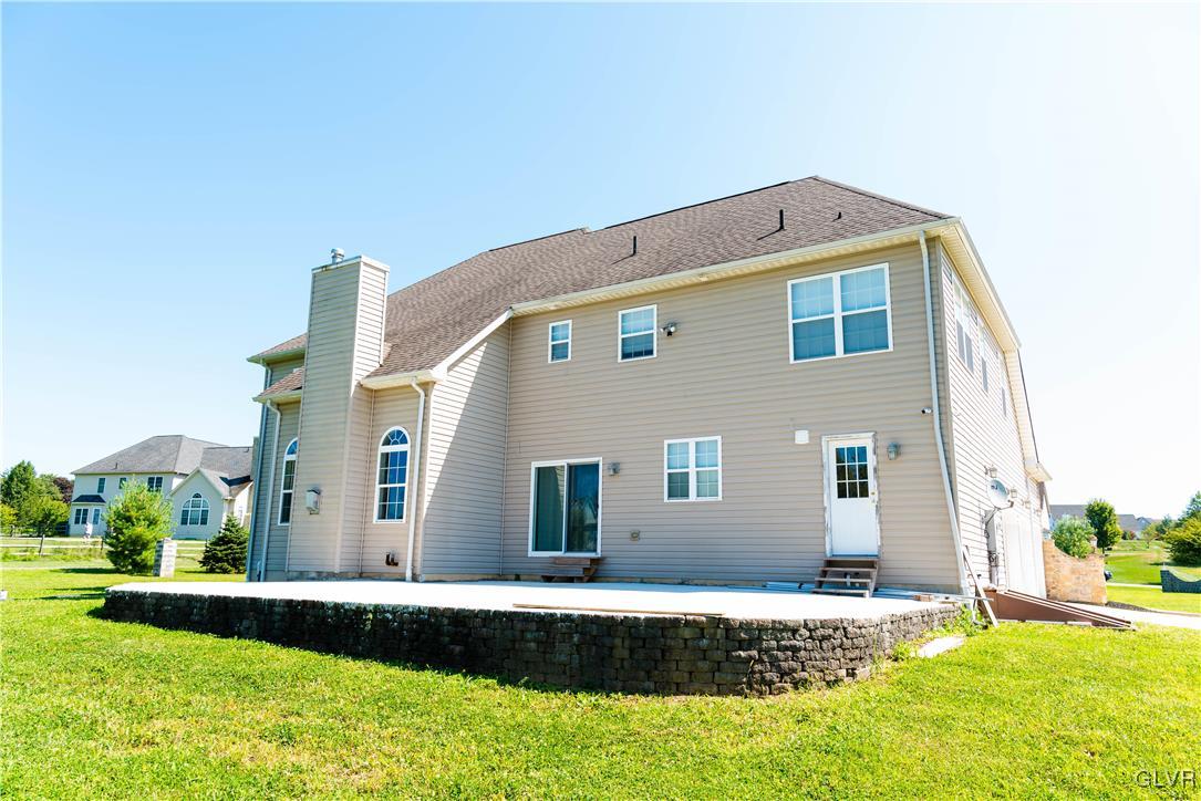 140 Fox Ridge Nazareth, PA 18064 - Photo 22 of 24 a front view of a house with garden
