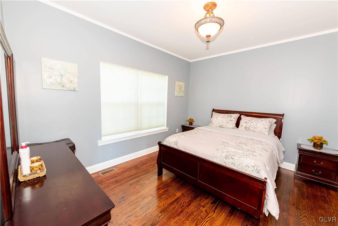 140 Fox Ridge Nazareth, PA 18064 - Photo 5 of 24 a large bed sitting in a bedroom next to a window