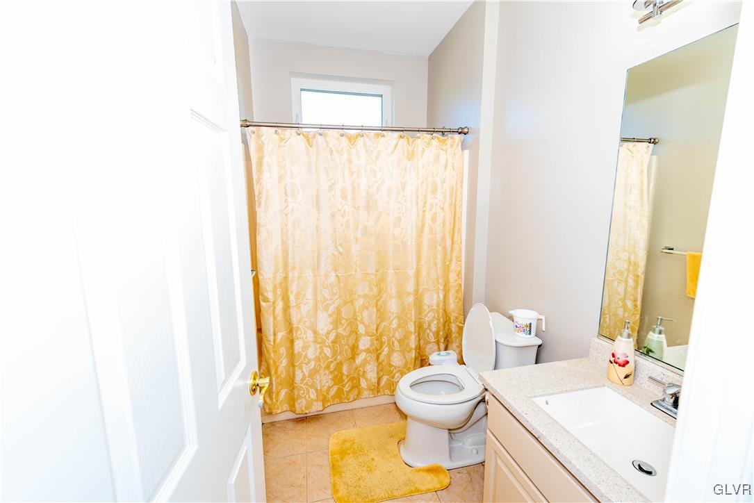 140 Fox Ridge Nazareth, PA 18064 - Photo 6 of 24 a bathroom with a sink a toilet and tub