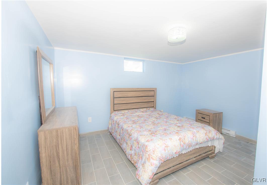 140 Fox Ridge Nazareth, PA 18064 - Photo 10 of 24 a bedroom with a bed and a night stand