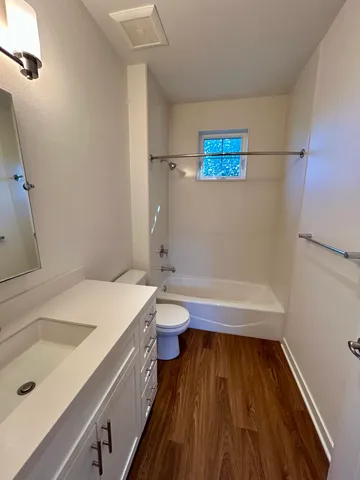 a bathroom with a sink and a bathtub