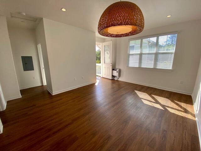 1518 Castillo Street, Unit C Santa Barbara, CA 93101 - Photo 7 of 7 an empty room with wooden floor and windows