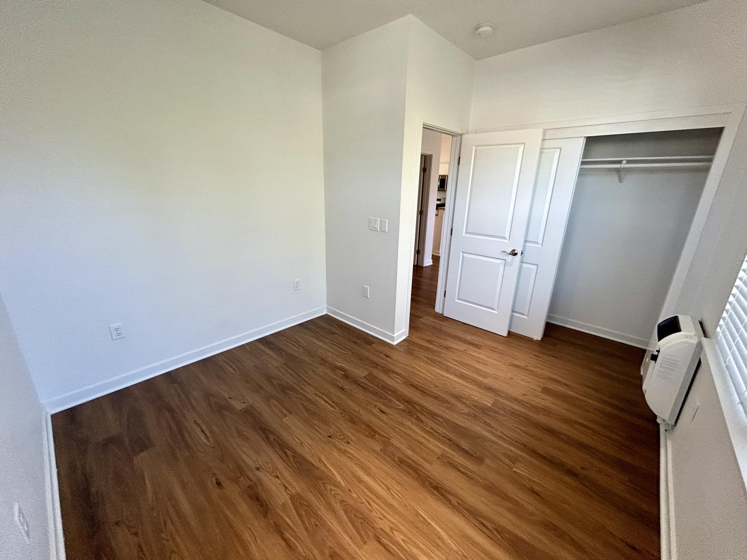 1518 Castillo Street, Unit C Santa Barbara, CA 93101 - Photo 10 of 13 a view of an empty room with wooden floor and closet