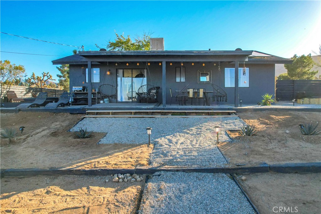 60670 Pueblo Trail Joshua Tree, CA 92252 - Photo 13 of 14 a view of a house with swimming pool