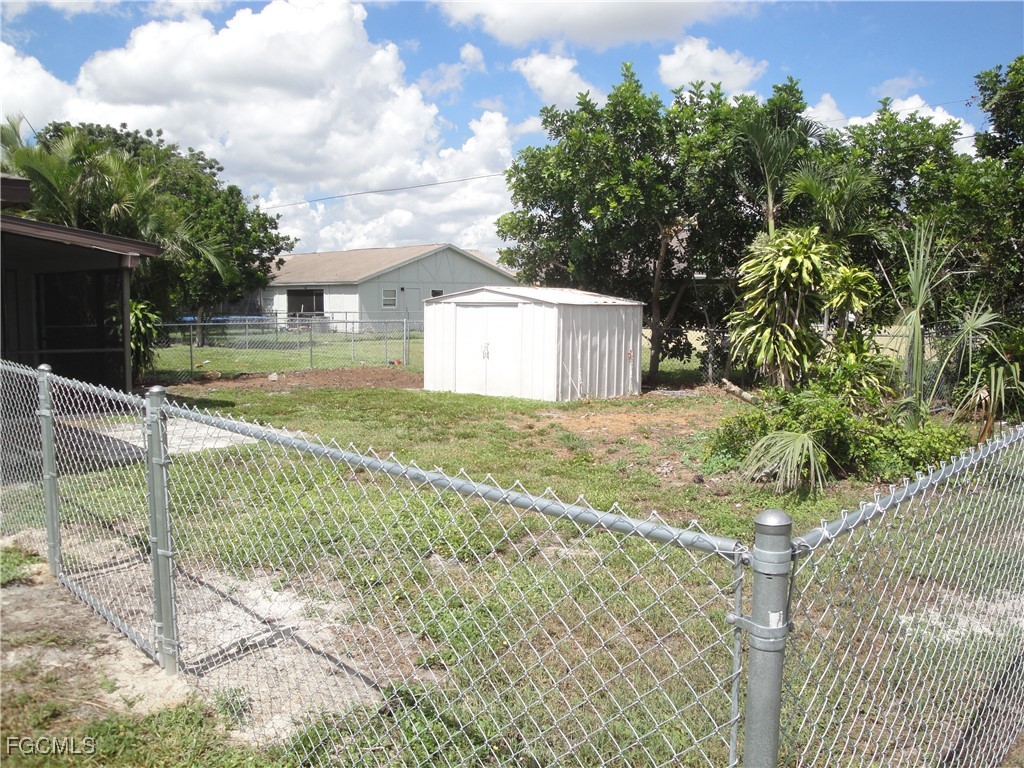 7487 Mellon Road Fort Myers, FL 33967 - Photo 10 of 10 a view of a house with a yard