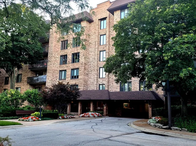 a front view of a building with street view