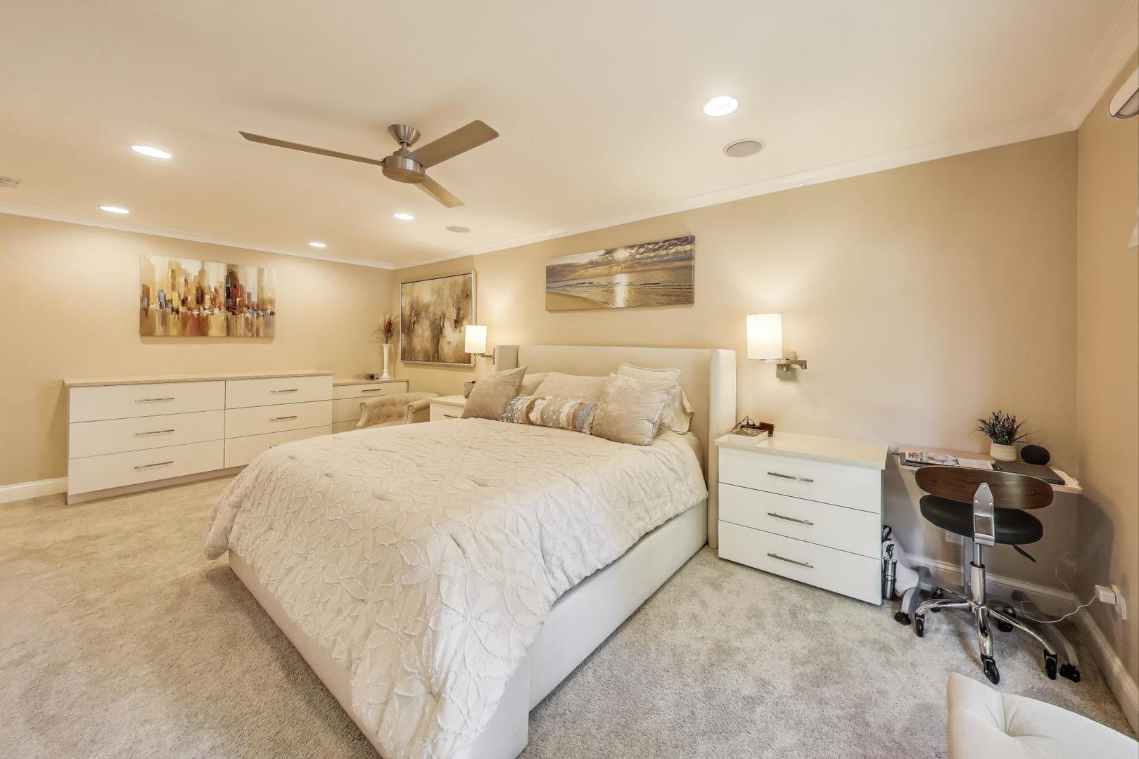 3810 Mission Hills Road, Unit 202 Northbrook, IL 60062 - Photo 12 of 25 a bedroom with a bed and a desk