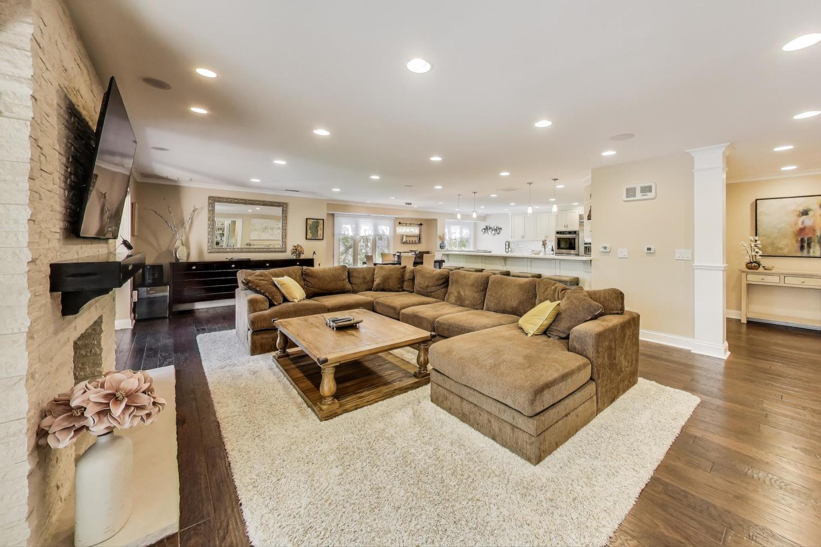 3810 Mission Hills Road, Unit 202 Northbrook, IL 60062 - Photo 5 of 25 a living room with stainless steel appliances furniture and a view of kitchen