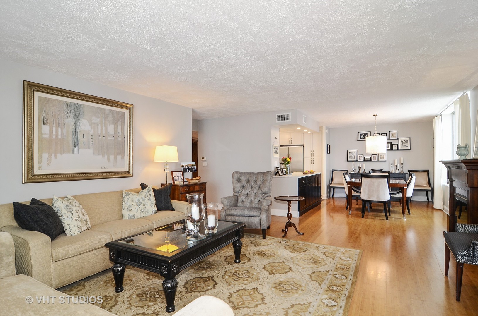 201 East Chestnut Street, Unit 20A Chicago, IL 60611 - Photo 3 of 13 a living room with furniture and wooden floor