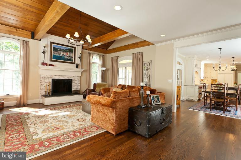 7 Roland Court Towson, MD 21204 - Photo 11 of 25 a living room with furniture wooden floor and a fireplace