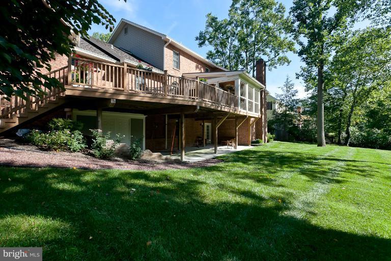 7 Roland Court Towson, MD 21204 - Photo 15 of 25 a front view of house with yard and green space