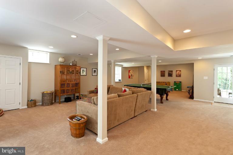 7 Roland Court Towson, MD 21204 - Photo 17 of 25 a view of a livingroom with furniture and windows