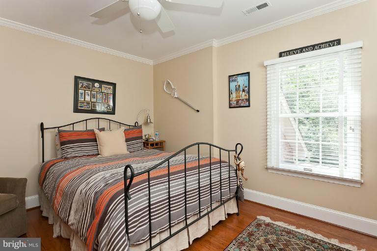 7 Roland Court Towson, MD 21204 - Photo 23 of 25 a bedroom with bed and a window