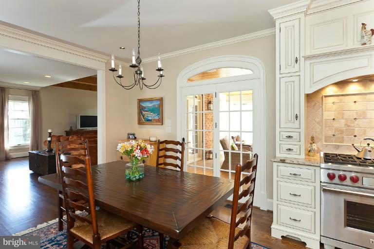 7 Roland Court Towson, MD 21204 - Photo 6 of 25 a view of a dining room with furniture window and wooden floor