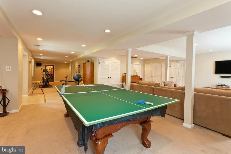 7 Roland Court Towson, MD 21204 - Photo 9 of 25 a room with pool table and flat screen tv